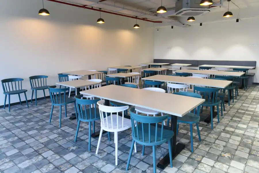 yesssworks pune coworking canteen tables photos