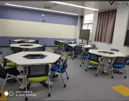 training room chairs with writing pad